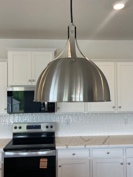 This modern kitchen features sleek appliances and