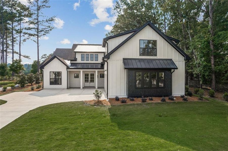 Front exterior of a new home in , Eatonton, GA, highlighting curb appeal (Image 27). Front exterior of a new home in , Eatonton, GA, highlighting curb appeal (Image 27).