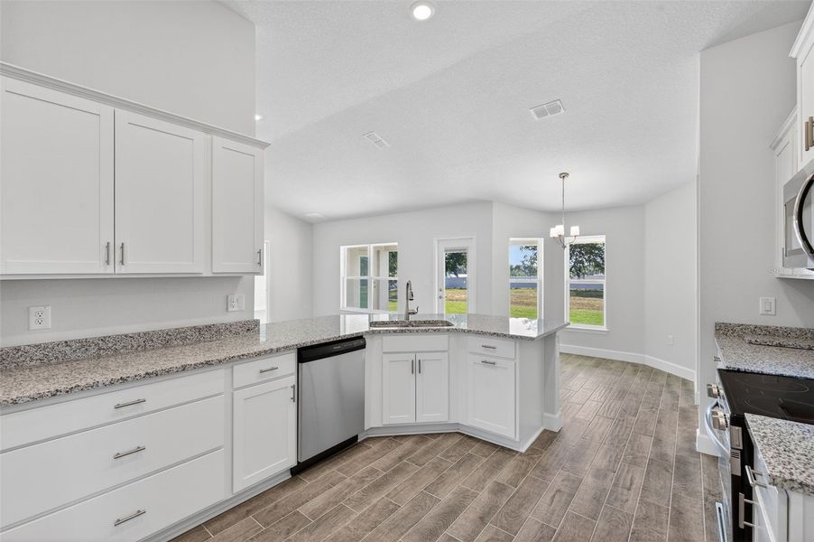 Furnished interior view inside a new home in Hill Country Estates, Dade City (Image 8).