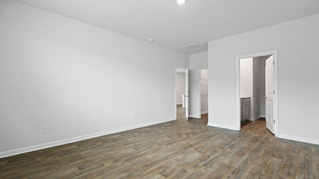 Spacious, unfurnished interior of a new home in Pine Hills at Cane Bay, Summerville (Image 15). Spacious, unfurnished interior of a new home in Pine Hills at Cane Bay, Summerville (Image 15).