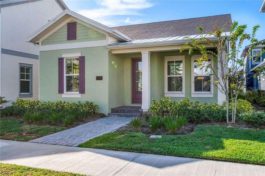 Exterior details and patio area of a home in Summerdale Park at Lake Nona, Orlando (Image 18).