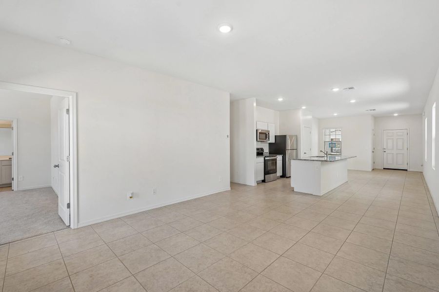 Representative unfurnished interior of a home built from the Sterling by Starlight Homes in Agave Trails, Buckeye (Image 10).