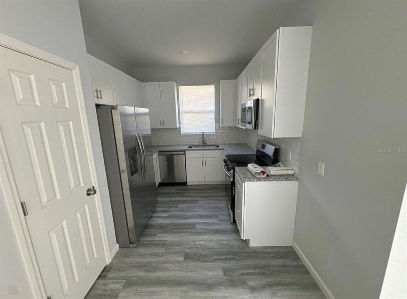 Furnished interior view inside a new home in , Orlando (Image 3).