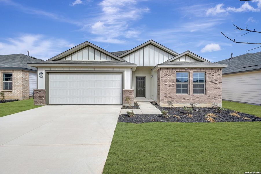 Front exterior of a new home in Winding Brook, San Antonio, TX, highlighting curb appeal (Image 25).