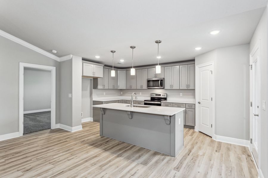Representative furnished interior of a home built from the The Liberty by Herbst Homes in Clear Water Landing, Milton (Image 6).