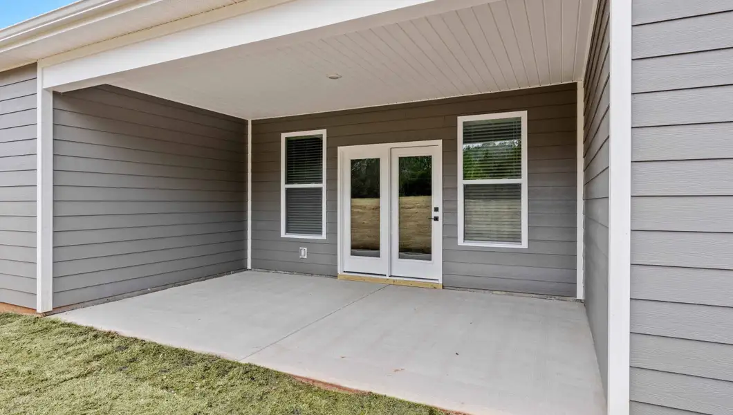 Exterior details and patio area of a home in Arrowood Acres, Enoree (Image 3). Exterior details and patio area of a home in Arrowood Acres, Enoree (Image 3).