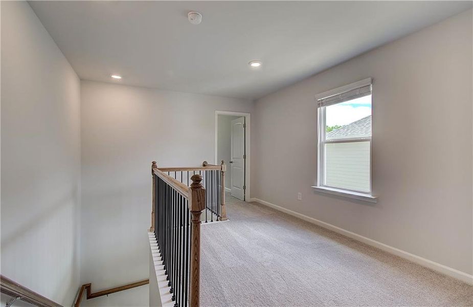 Spacious, unfurnished interior of a new home in Enclave at Evergreen, Fairburn (Image 22).