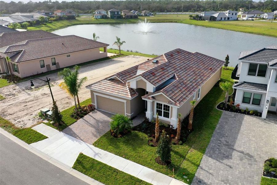 Front exterior of a new home in Marina Del Palma, Palm Coast, FL, highlighting curb appeal (Image 2).