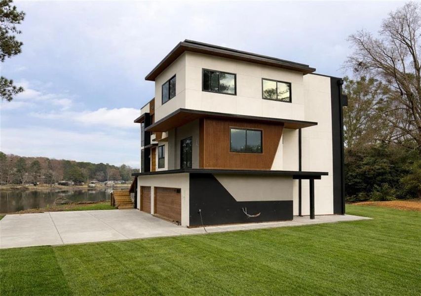 Front exterior of a new home in , Jonesboro, GA, highlighting curb appeal (Image 4).