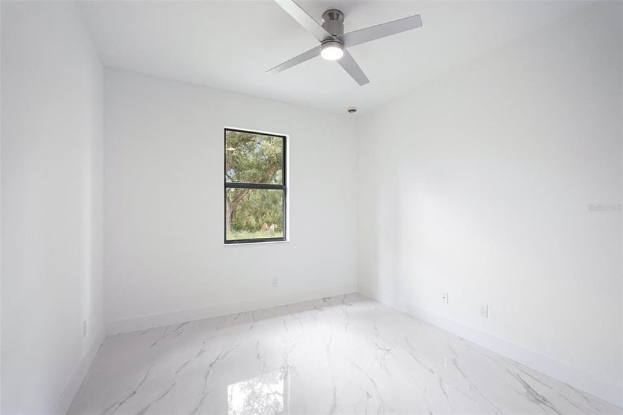 Spacious, unfurnished interior of a new home in , Port Charlotte (Image 32).
