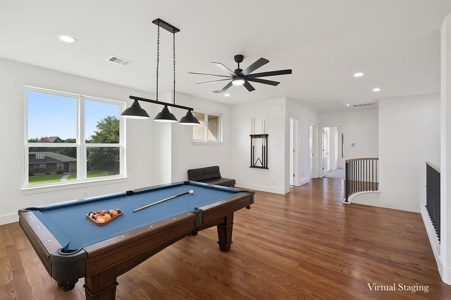 Recreation room with wood finished floors, recessed lighting, pool table, and attic access