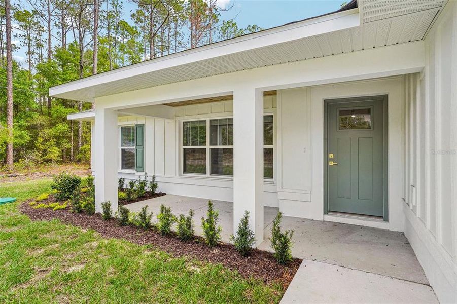 Exterior details and patio area of a home in , Citrus Springs (Image 39).