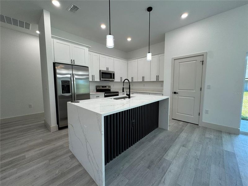 Furnished interior view inside a new home in , Port Charlotte (Image 5). Furnished interior view inside a new home in , Port Charlotte (Image 5).