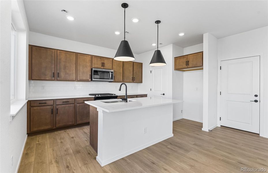 Furnished interior view inside a new home in Harvest Crossing, Aurora (Image 4). Furnished interior view inside a new home in Harvest Crossing, Aurora (Image 4).