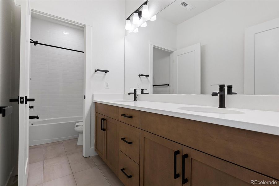 Upper level secondary bathroom