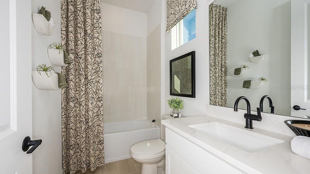 Furnished interior view inside a new home in Center Lake Ranch Community Group Page, St. Cloud (Image 20).