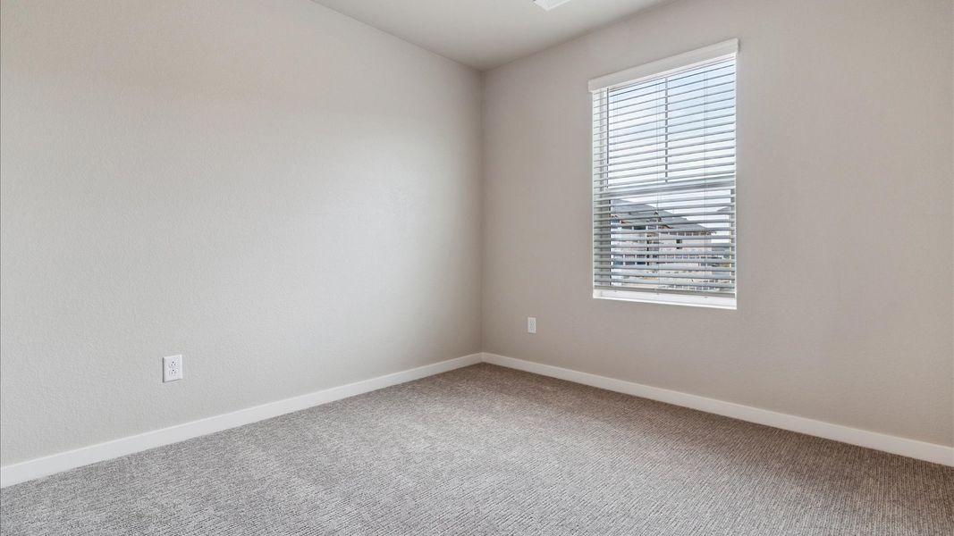 Spacious, unfurnished interior of a new home in Sky Ranch, Watkins (Image 23).