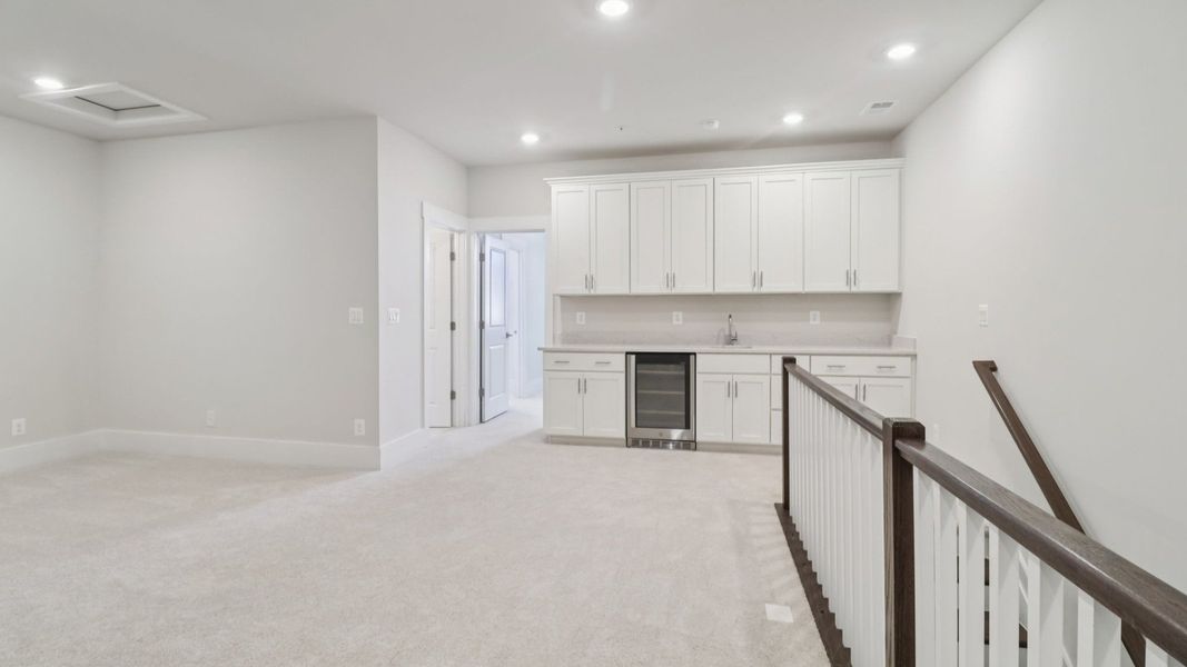 The Awaken Plan by DRB Elevate in Brook Run, Fort Mill SC - Loft with Wet bar