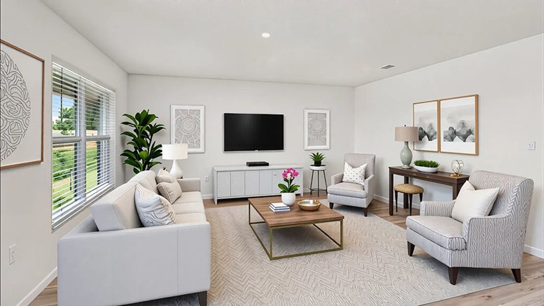 Representative furnished interior of a home built from the Aria by D.R. Horton in Emerson Pointe, Ocala (Image 5).