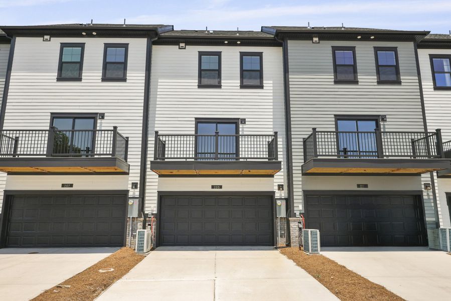 Front exterior of a new home in Nexton, Summerville, SC, highlighting curb appeal (Image 34).