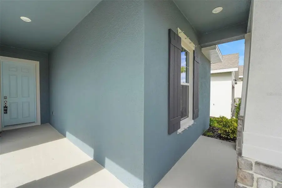 Exterior details and patio area of a home in Seaire, Parrish (Image 3). Exterior details and patio area of a home in Seaire, Parrish (Image 3).