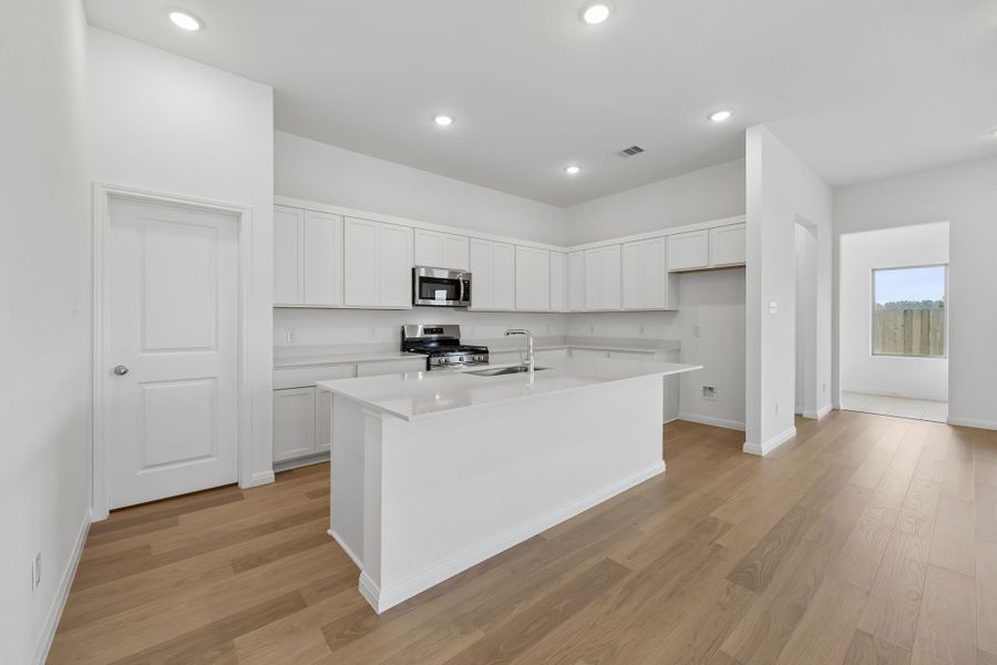 Furnished interior view inside a new home in Riviera Pines, Huffman (Image 6).