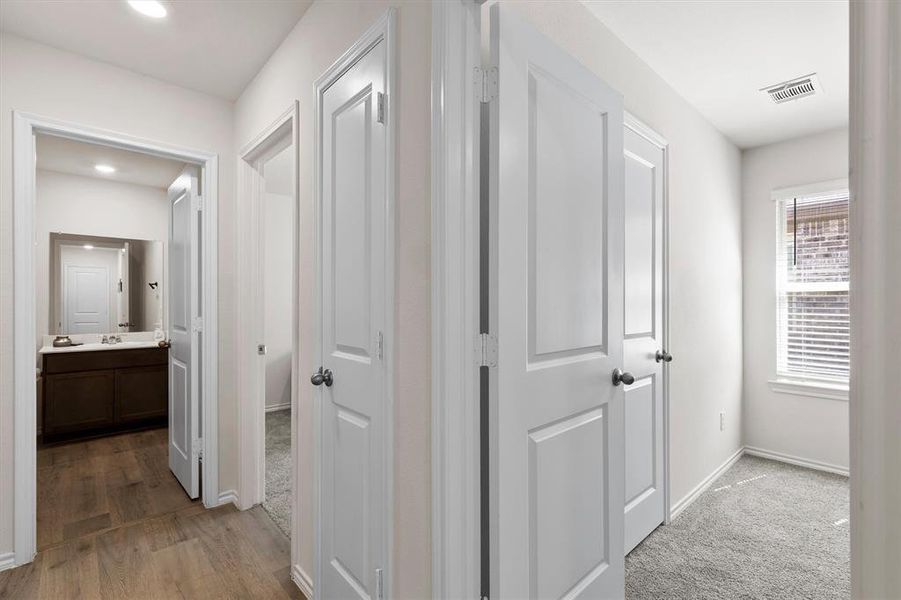 Corridor featuring baseboards Corridor featuring baseboards