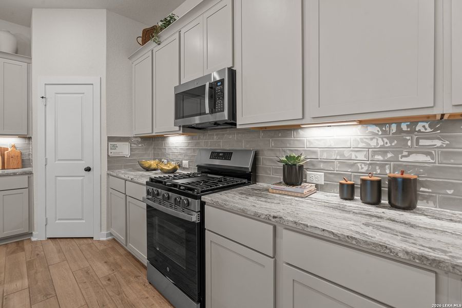 Furnished interior view inside a new home in The Crossvine, Schertz (Image 28).