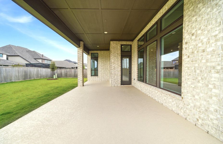 Exterior details and patio area of a home in Bridgeland 60′, Cypress (Image 25).