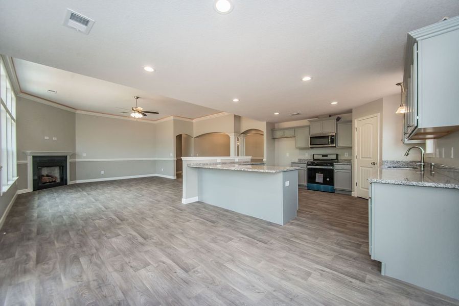 Representative furnished interior of a home built from the Beaumont by Enchanted Homes in Guadalupe Heights, Seguin (Image 17).