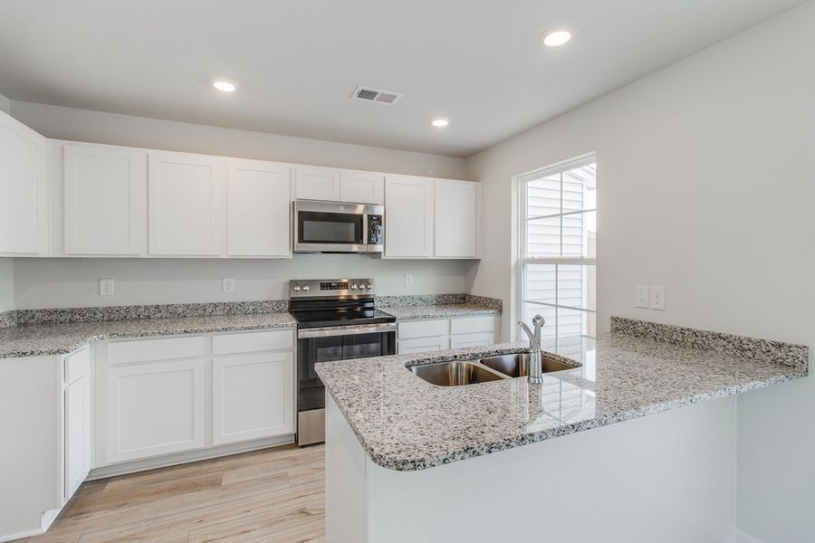 Furnished interior view inside a new home in Padgett Commons, Hopkins (Image 7).
