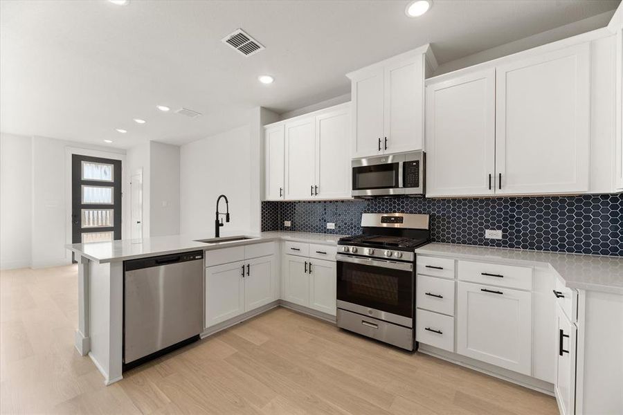 Beautiful finishes and thoughtful design make this kitchen stand out form the crowd!