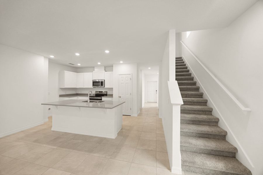Furnished interior view inside a new home in Beresford Woods, Deland (Image 5).