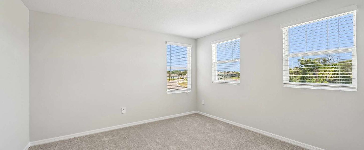 Bedroom 3 also located off the front of the home with three windows - Representative images and renderings are for illustrative purposes Bedroom 3 also located off the front of the home with three windows - Representative images and renderings are for illustrative purposes