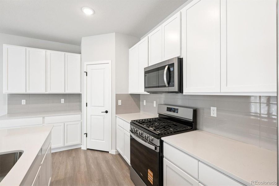 Furnished interior view inside a new home in Coyote Creek, Fort Lupton (Image 6).