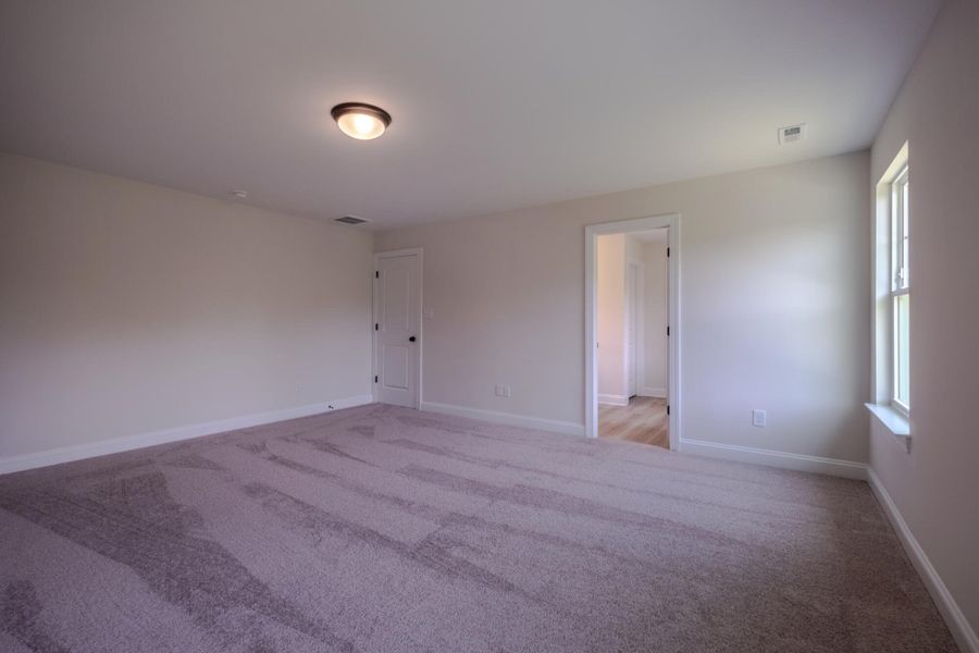 Spacious, unfurnished interior of a new home in Cottages at Piper Village, Trinity (Image 31). Spacious, unfurnished interior of a new home in Cottages at Piper Village, Trinity (Image 31).