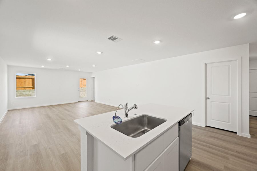 Furnished interior view inside a new home in Sunterra, Katy (Image 5).