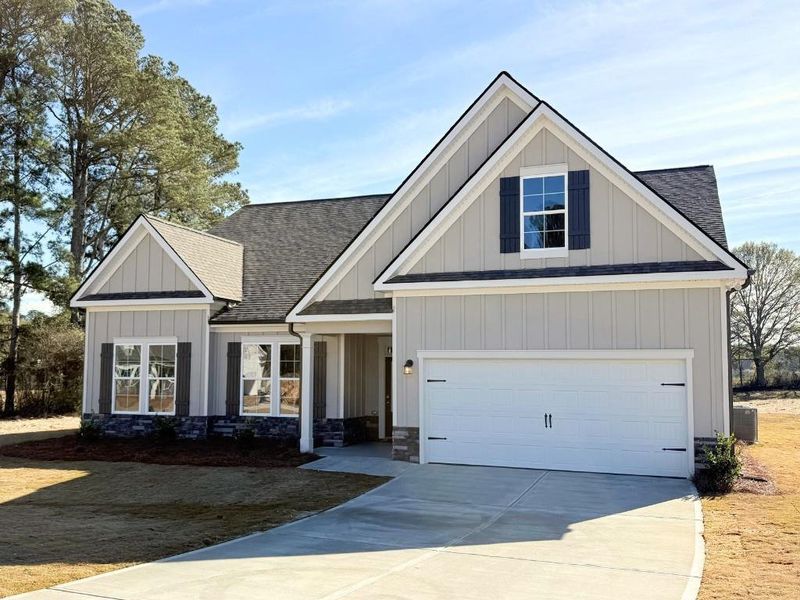 Front exterior of a new home in Westlyn, Winder, GA, highlighting curb appeal (Image 2). Front exterior of a new home in Westlyn, Winder, GA, highlighting curb appeal (Image 2).