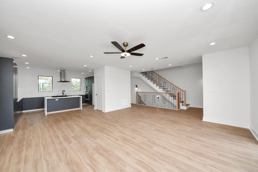 Where the living room flows into the kitchen -- so nobody missed a moment (or a snack)!