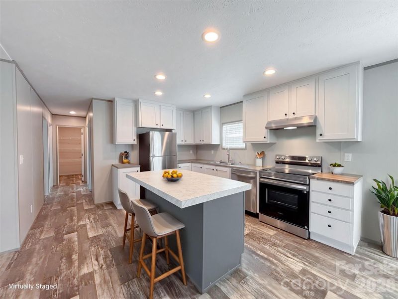 Furnished interior view inside a new home in , Connelly Springs (Image 9).