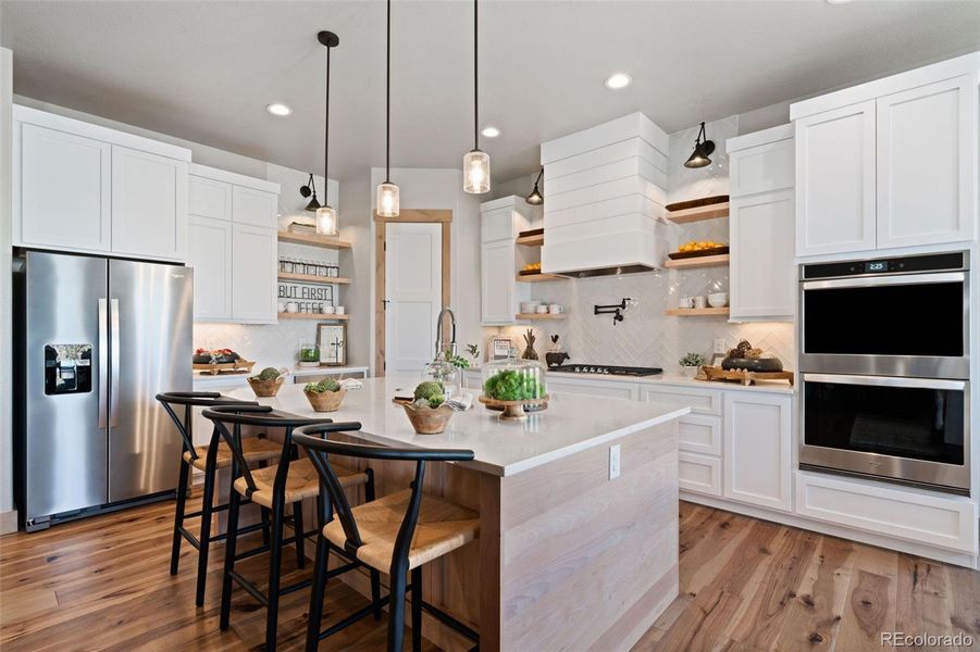 Upgraded Gourmet Kitchen with Walk-in Pantry