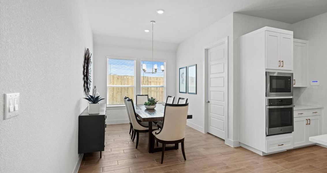 Representative furnished interior of a home built from the Wyatt by Chesmar Homes in Sunfield, Buda (Image 7).