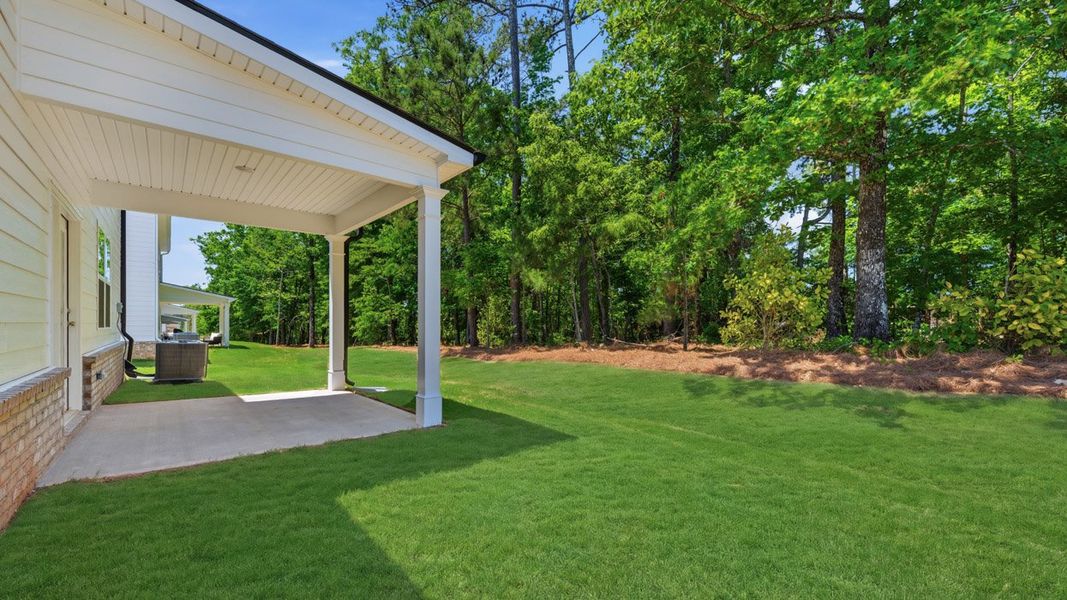 Exterior details and patio area of a home in Kingston Ranch at Lake Oconee, Buckhead (Image 2).