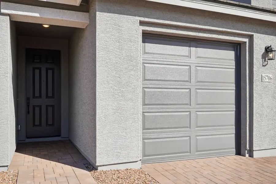 Exterior elevation, covered entry. Finishes and options may vary by community