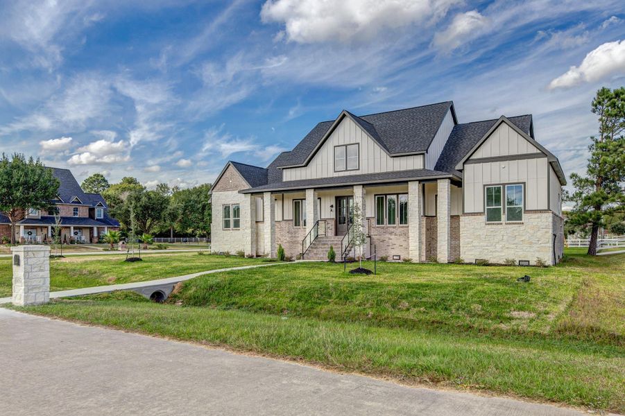 Front exterior of a new home in , Cypress, TX, highlighting curb appeal (Image 25).