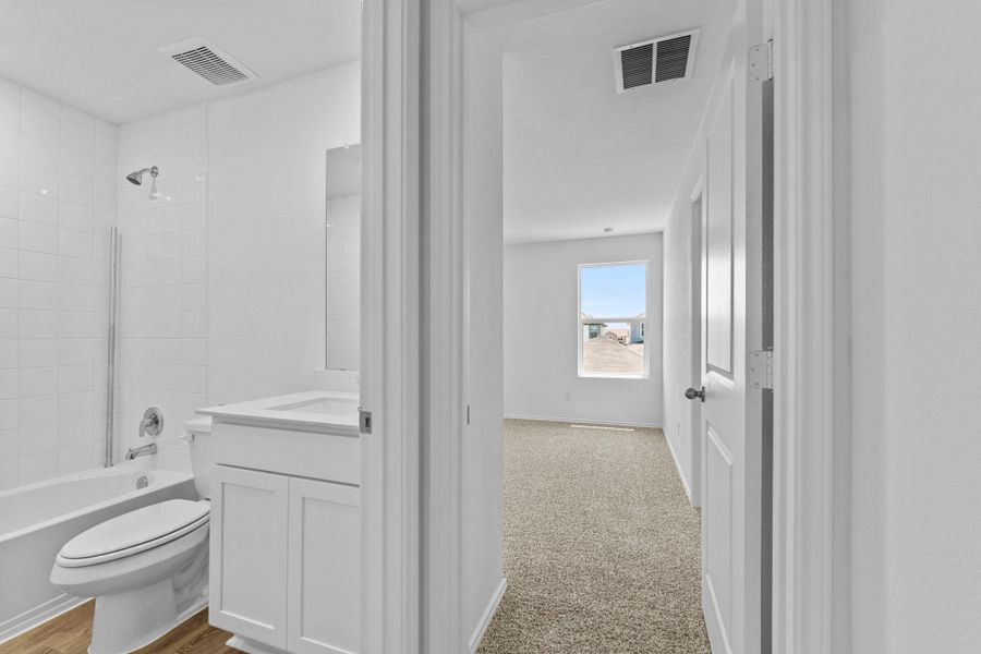 Furnished interior view inside a new home in Valverde, Bastrop (Image 13).