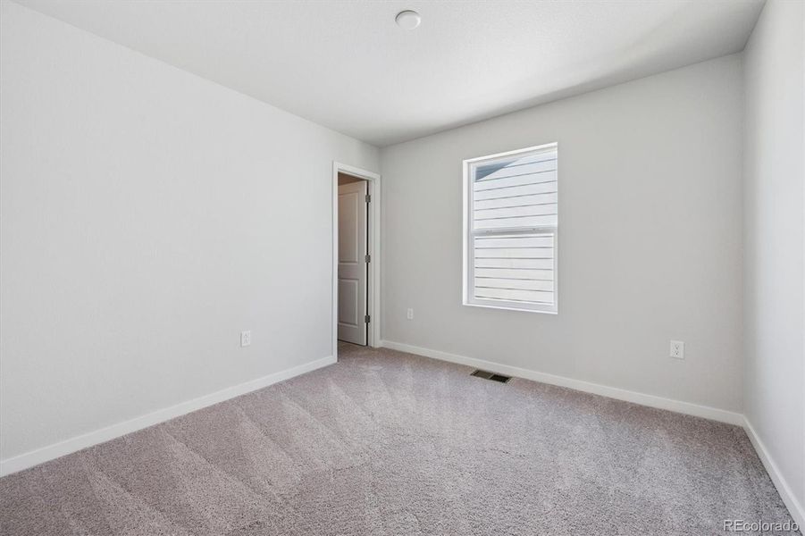 Spacious, unfurnished interior of a new home in Farmlore, Brighton (Image 11).