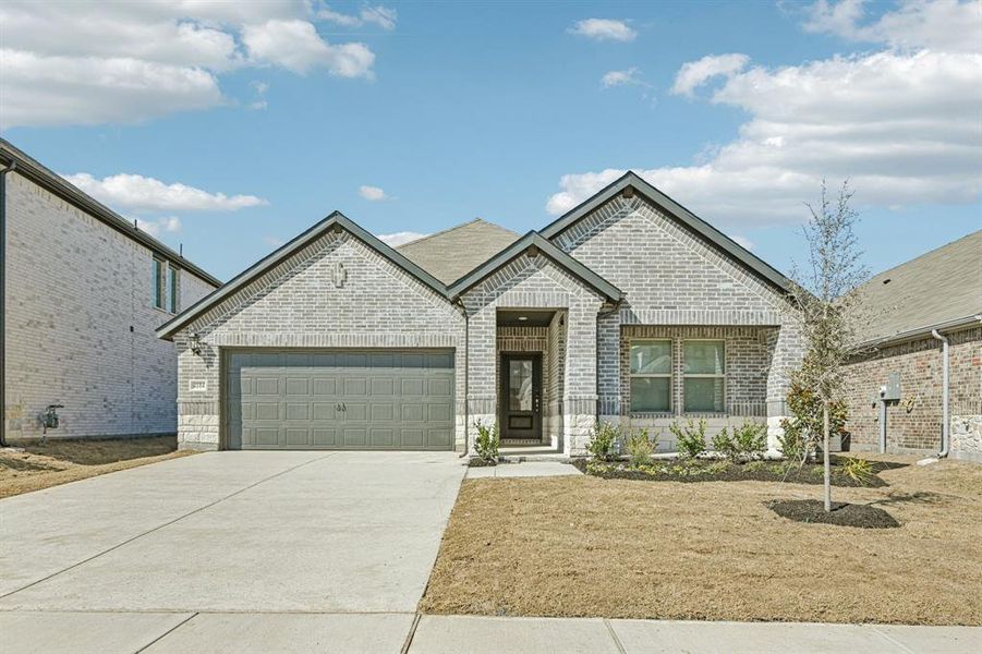 Front exterior of a home in the Lakehaven - Signature Series community, located in Farmersville, TX (Image 12).