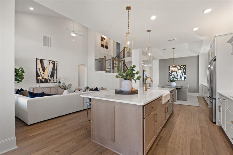 Kitchen opens to living area and breakfast area