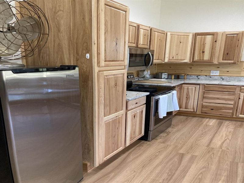 Furnished interior view inside a new home in , Whitney (Image 12).
